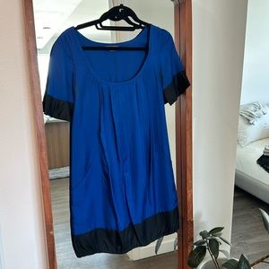100% silk.  Deep blue Armani exchange mini dress.